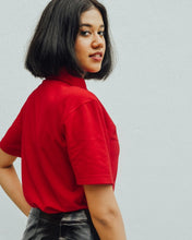 Load image into Gallery viewer, Female model is wearing red Magnetic T-shirt, features magnetic buttons for easy wear. Adaptive clothing by Dawn Adaptive that makes dressing up easier.